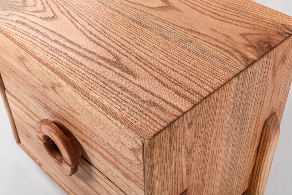 Oak Two-Drawer Nightstand with Round Handle Detail