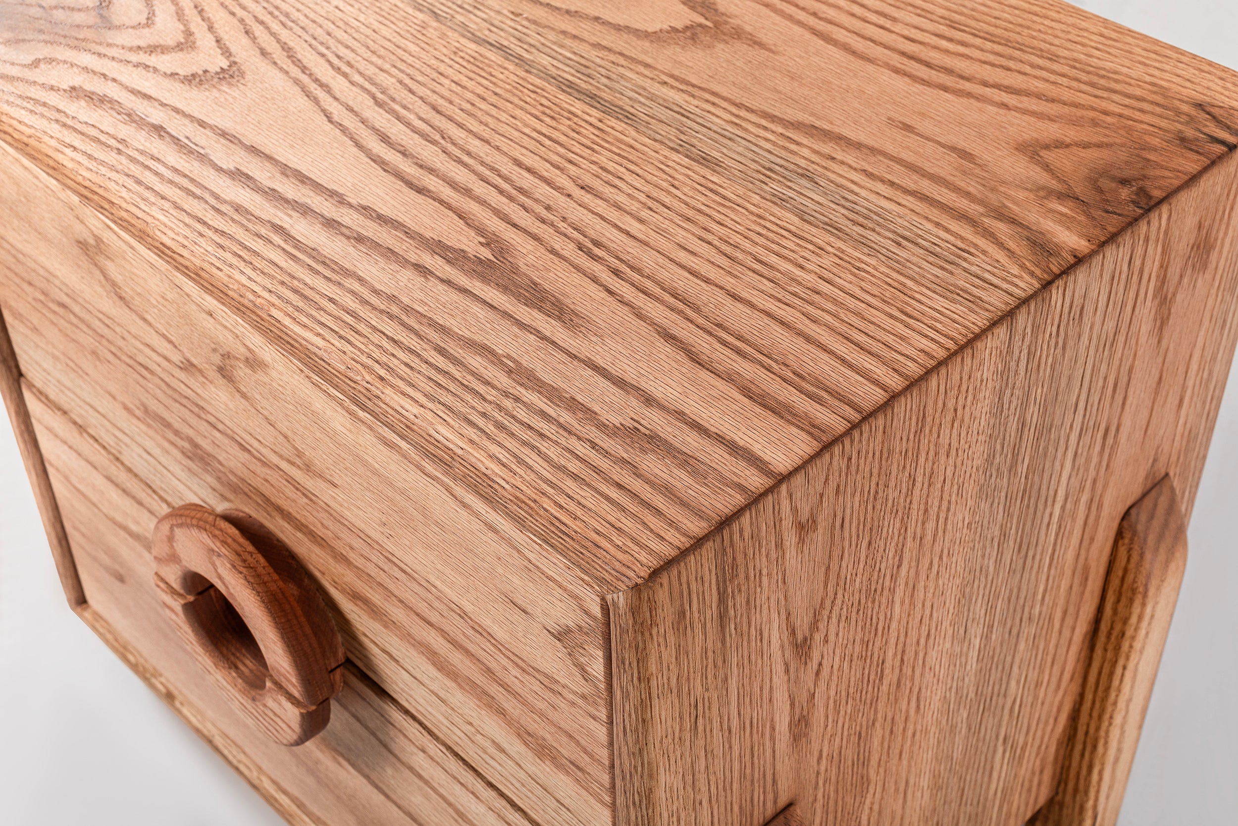 Oak Two-Drawer Nightstand with Round Handle Detail