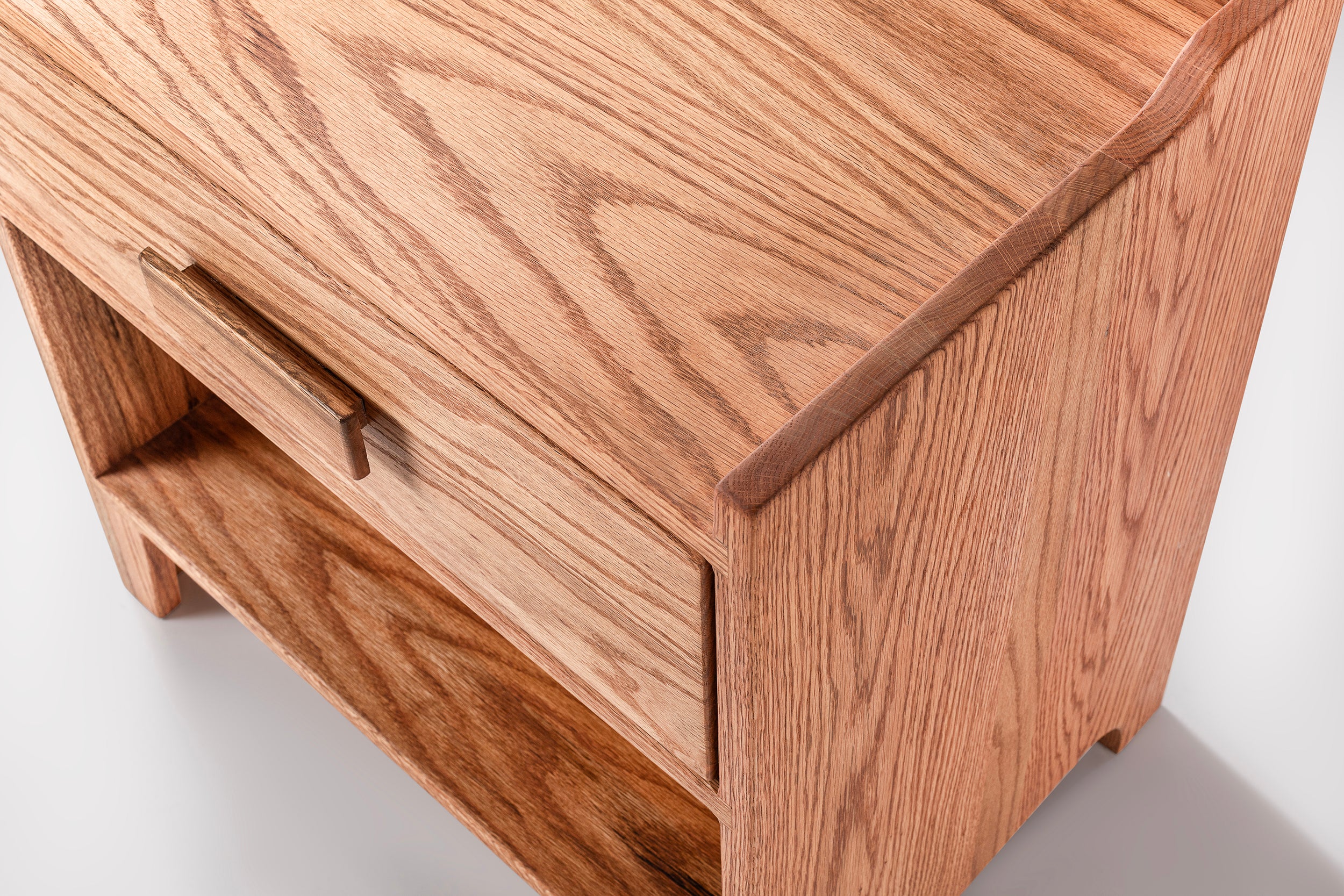 Oak Wood Nightstand with Single Drawer and Shelf, Top Shield Detail