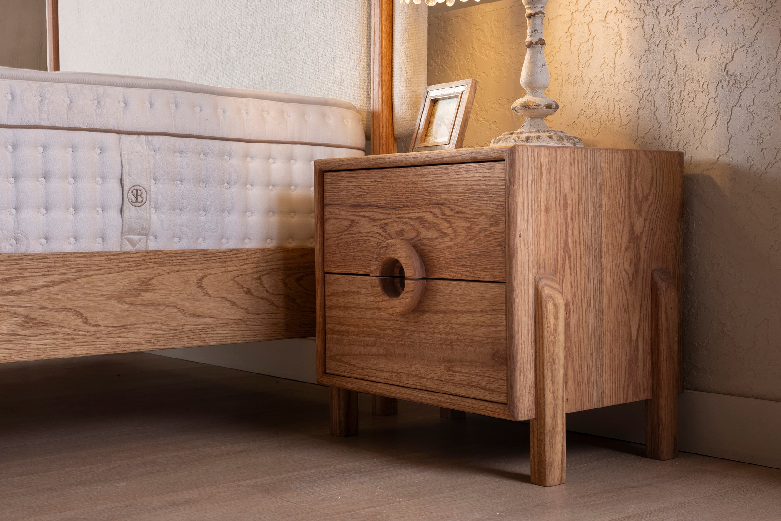 Oak Two-Drawer Nightstand with Round Handle Detail