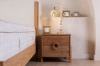 Oak Two-Drawer Nightstand with Round Handle Detail